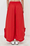 Pantalone ampio con fondo a balza arricciata