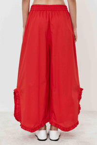 Pantalone ampio con fondo a balza arricciata