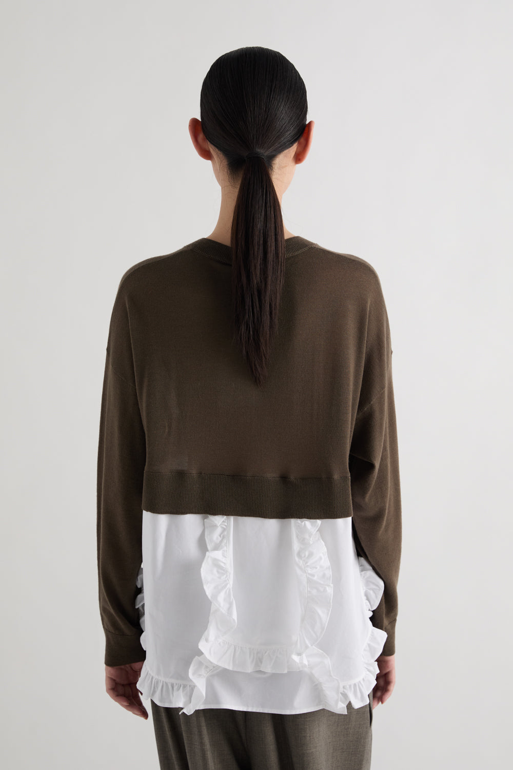 CARDIGAN CON BALZA AL FONDO